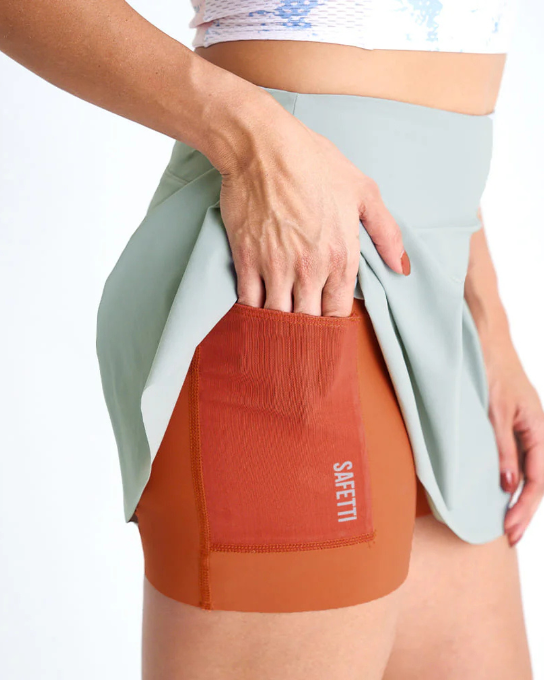 FALDA SHORT RUNNING/PADEL GRIS SAFETTI DAMA