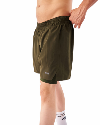 PANTALONETA RUNNING ANONYMOUS PERFORMANCE VERDE HOMBRE