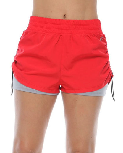 SHORT RUNNING NATIVOS CON LICRA GRIS DAMA