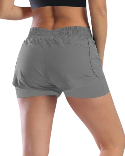 SHORT RUNNING NATIVOS CON LICRA GRIS DAMA
